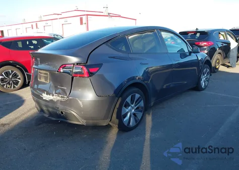 2023 Tesla Model Y Awd/Long Range Dual Motor All-Wheel Drive z USA, uszkodzony, nr VIN 7SAYGDEE1PA061587